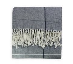 Acomoda Textil - Manta con Flecos.