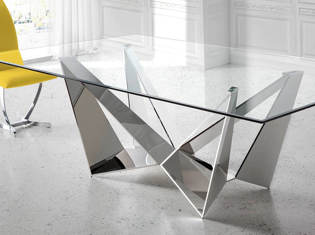Mesa de despacho con tapa de cristal templado y estructura de acero  inoxidable cromado.