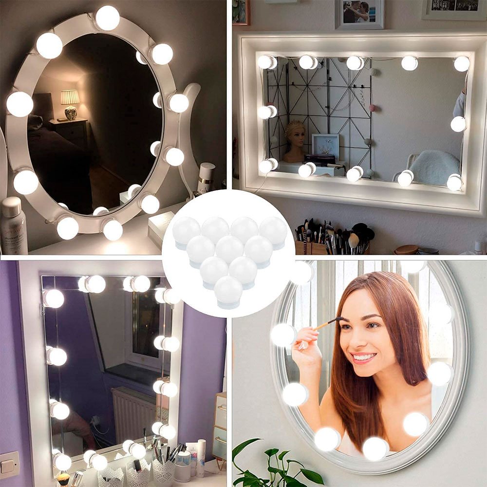 Tocador de maquillaje blanco moderno con espejo y retroiluminación en un  primer plano de la pared blanca
